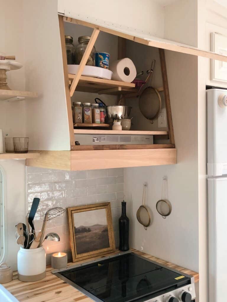 Hidden storage over stove